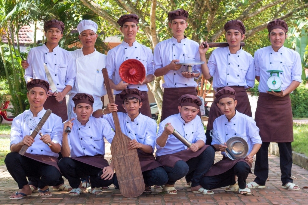 A class of 10 and an instructor. La Boulangerie Française, Huế, Vietnam
