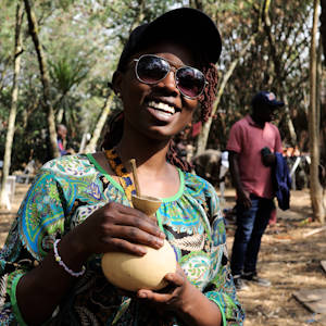 Red Rocks Cultural Festival Postcard from Rwanda Emma Raissa with banana beer