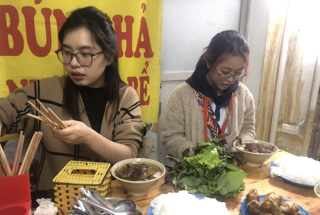 Postcard from Vietnam: Guided by young people through Hanoi’s Old Quarter and sharing a meal with them. Picture supplied by authors.