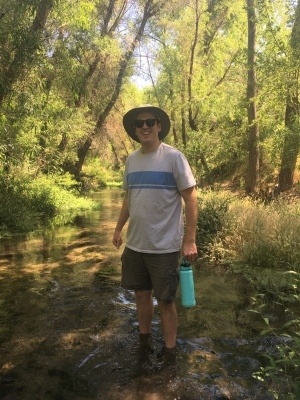 Connor Clark crossing el Río Cocóspera’s crystal clear waters,