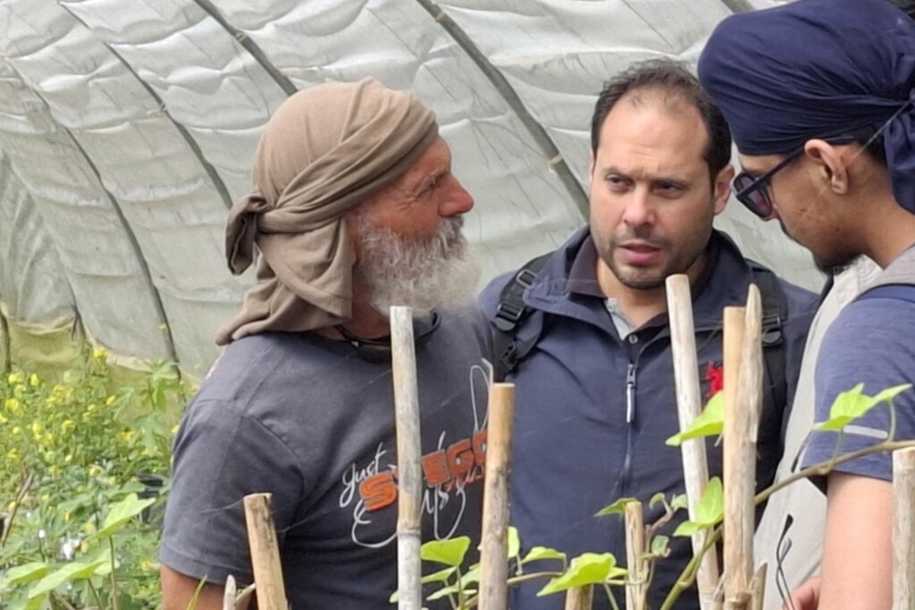 Charlie Vella discusses agriculture with Jim Butcher's study group at the Tan-Nixxiegħa Olive Grove in Malta