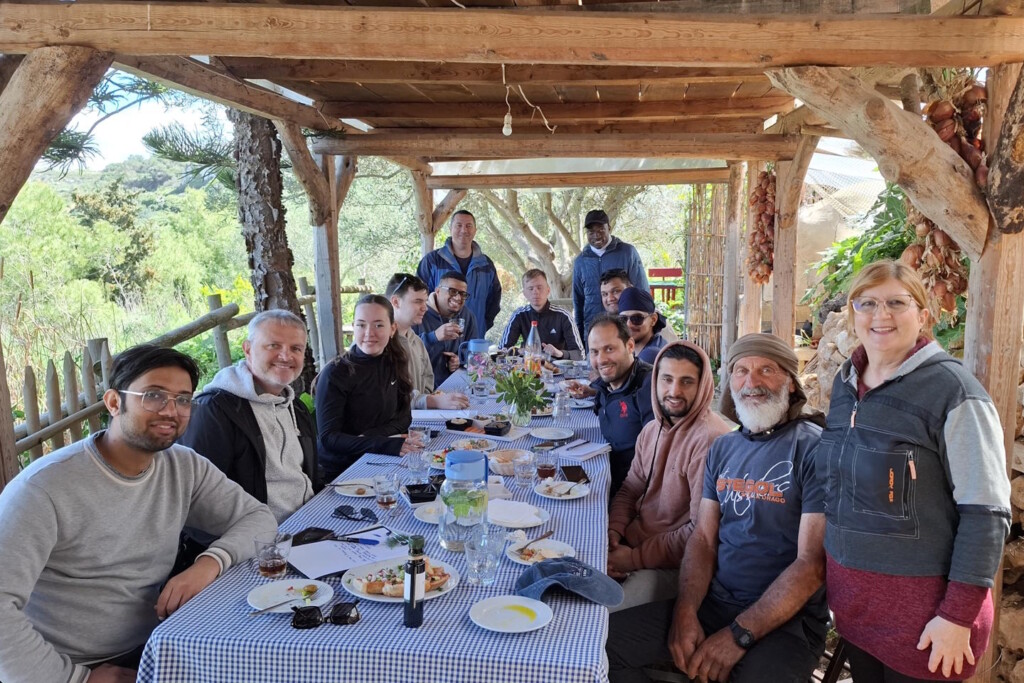 Jim Butcher's study group sample local produce at the Tan-Nixxiegħa Olive Grove in Malta. Christian Borg and Akin representing Merill Rural Network stand at the far end of the table. Bella Vella stands next to Charlie on the right. Picture by Jim Butcher.